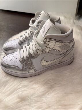 Jordan Women’s Mid-Top Sneakers in White & Silver Metallic